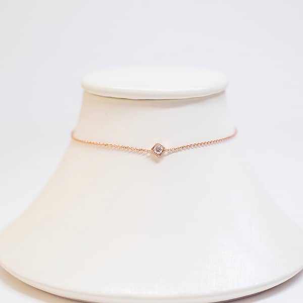 Bracelet, chaine en or rose 18 carats et diamant extra-blanc 0,04 carats